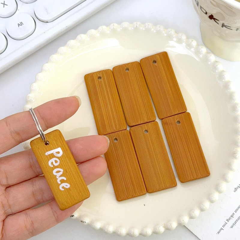 Blank Natural Bamboo Slice Key - Oud Wood Chip recension och pris